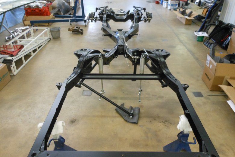 Here is the chassis back from blasting and powercoating. We also began installing the new air-ride suspension as well as some brake and fuel lines.