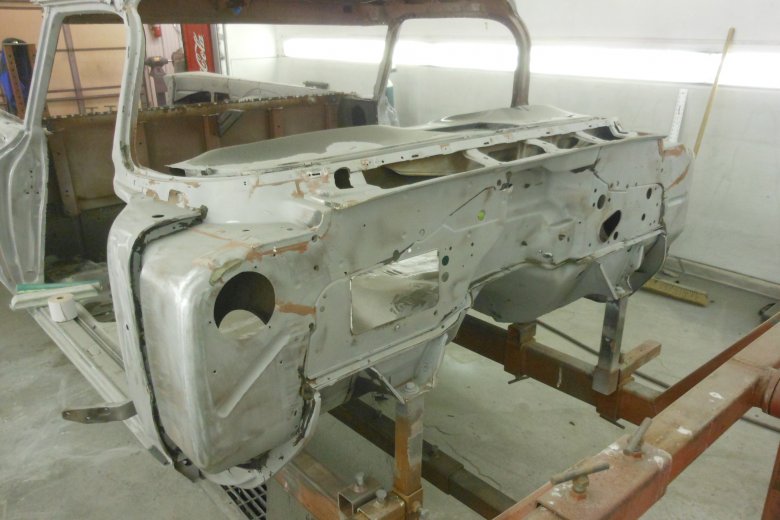 Here is the body after sandblasting everything that wasn't already stripped including the entire underside of the car.