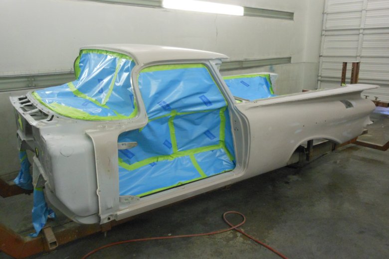 Here is the car after being wet sanded and masked for paint.