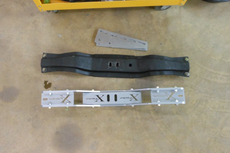 Here is the new and old transmission crossmember.