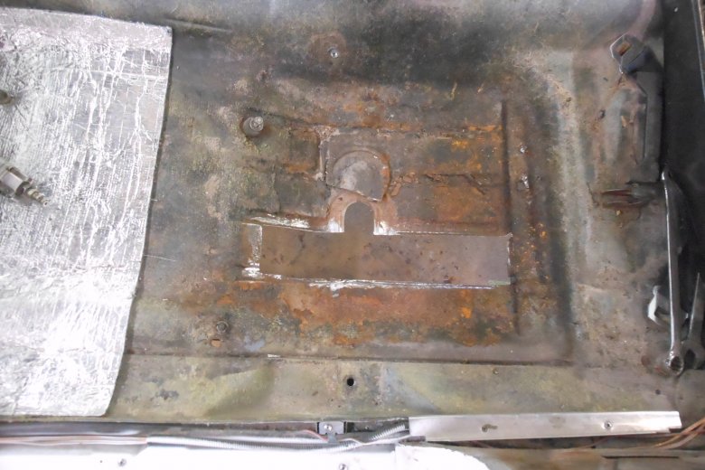 Here is the holes we had to cut in the rear floor pan to fit the subframe connectors.